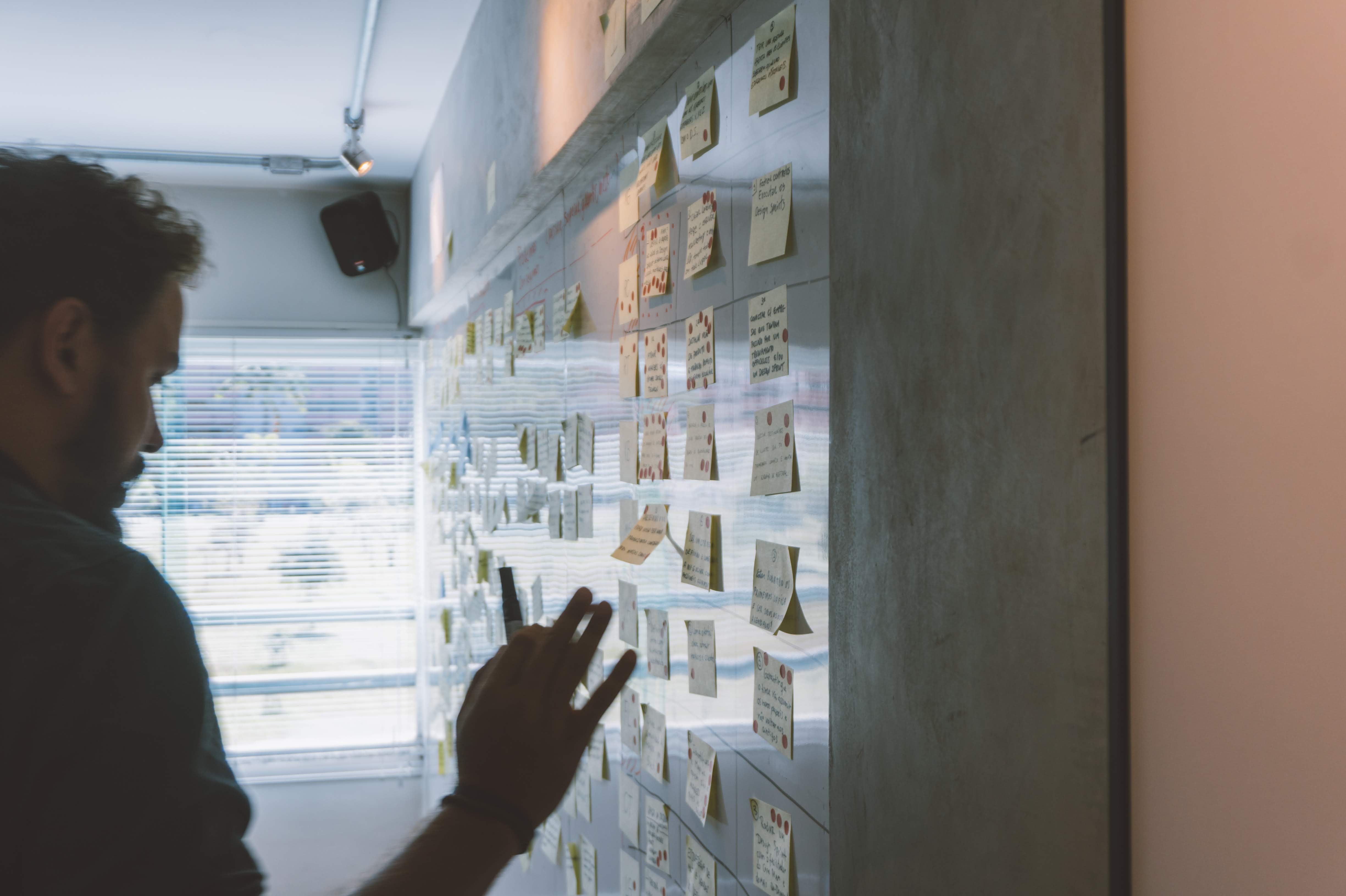 Youngman writing the information In planner board